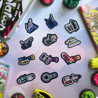 Sticker designs based off of weapons from the game Splatoon