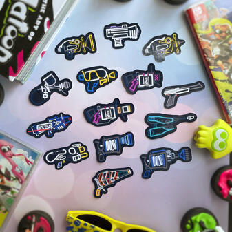Sticker designs based off of weapons from the game Splatoon