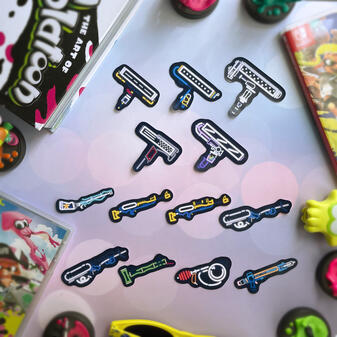 Sticker designs based off of weapons from the game Splatoon