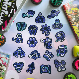 Sticker designs based off of weapons from the game Splatoon
